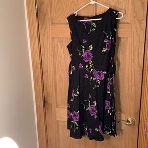 Sleeveless black dress with purple flowers